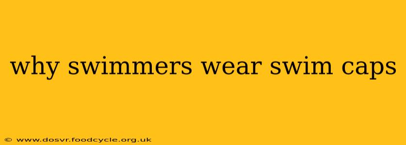 why swimmers wear swim caps