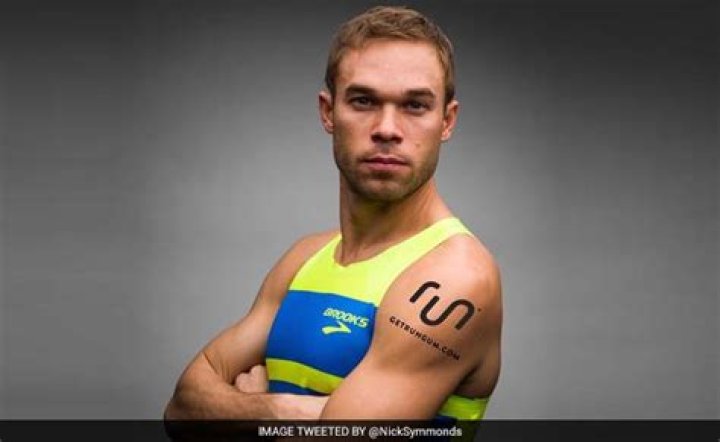 T-Mobile CEO John Legere Buys Ad Space On Shoulder Of Olympian Runner Nick Symmonds